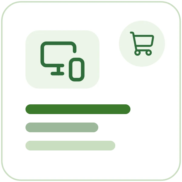 A laptop and phone beside a shopping cart