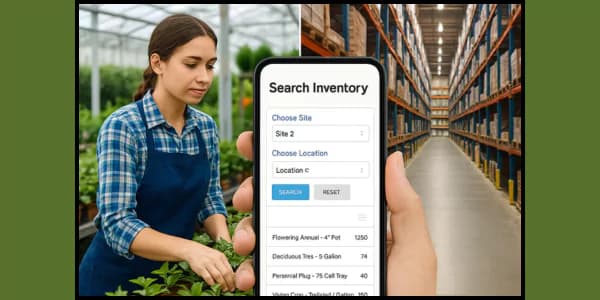 hand holding a phone with a greenhouse on the left and a warehouse on the right