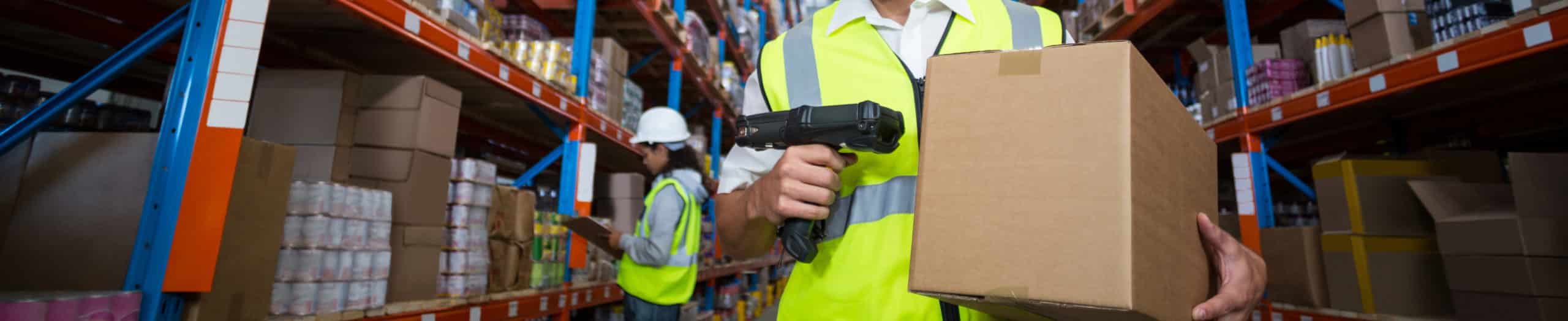 barcode scanning a box in a warehouse