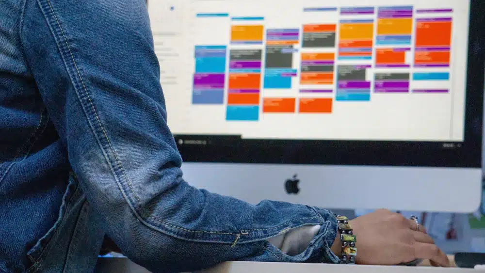 person viewing work calendar on a computer screen