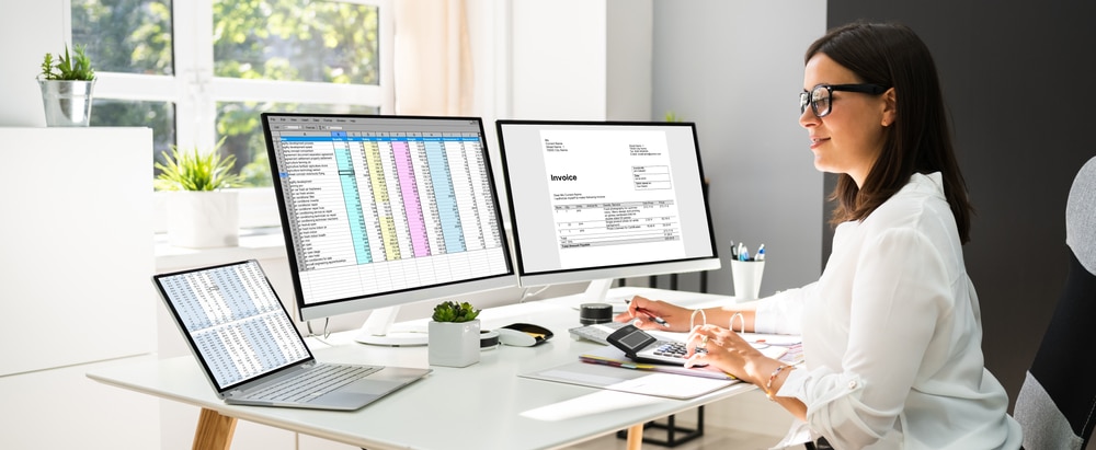 reviewing accounting reports on the computer