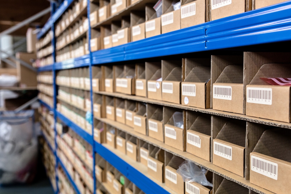 parts in a warehouse with a barcoded box for each type