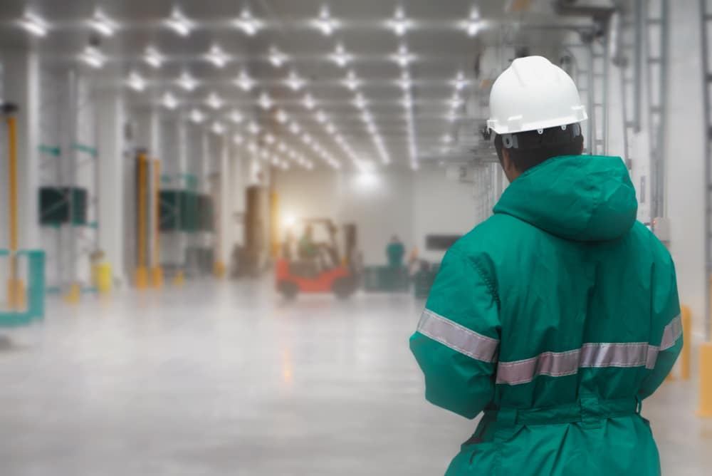 worker in a cold storage warehouse wearing a jacket