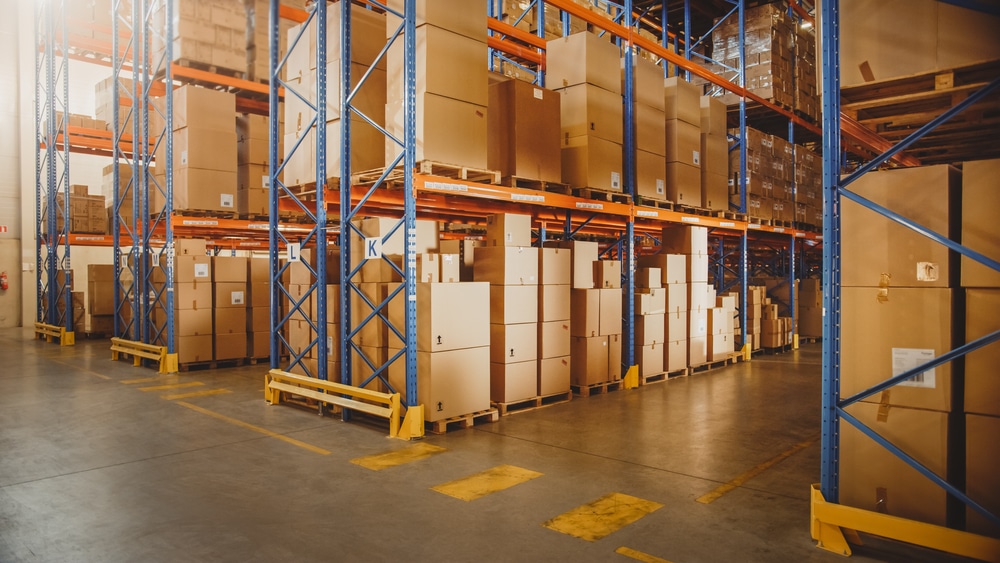 Large,Retail,Warehouse,Full,Of,Shelves,With,Goods,In,Cardboard warehouse shelves