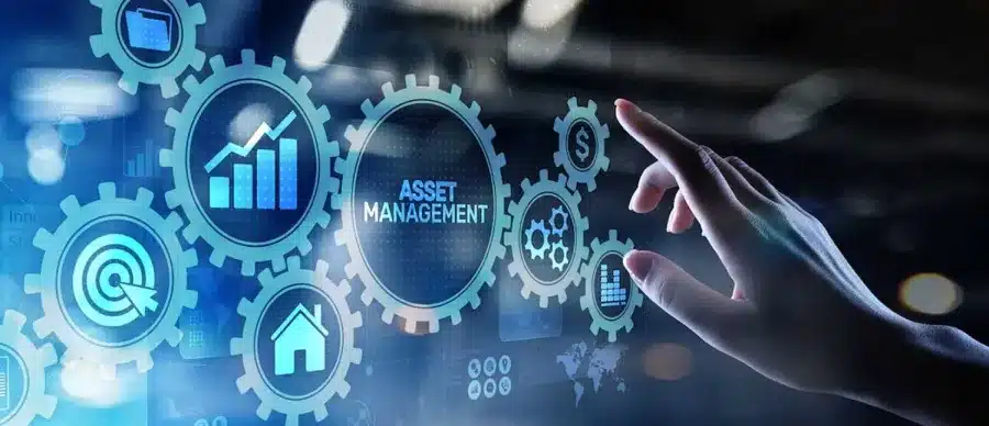 a-hand-touching-a-screen-with-gears-representing-different-processes The Essential Guide to Business Asset Management