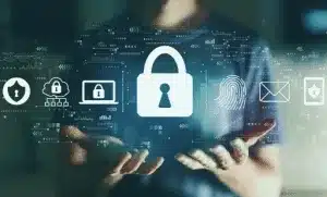 Cybersecurity protection Person holding digital security icons with padlock symbol representing cybersecurity threats protection